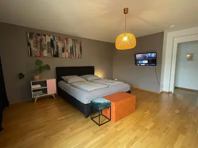 Ein Bett oder Betten in einem Zimmer der Unterkunft Checkpoint Charlie Apartment