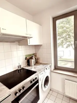 Küche/Küchenzeile in der Unterkunft Gemütliche Wohnung mit Balkon in Schönefeld