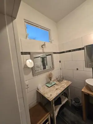 Ein Badezimmer in der Unterkunft Zum Fuchsbau - Schöneiche bei Berlin