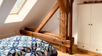 Ein Bett oder Betten in einem Zimmer der Unterkunft Ferienhof Weitblick