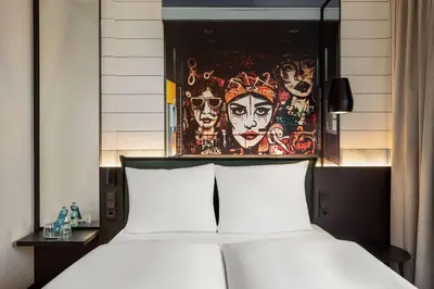 Ein Bett oder Betten in einem Zimmer der Unterkunft Vienna House Easy by Wyndham Berlin Potsdamer Platz