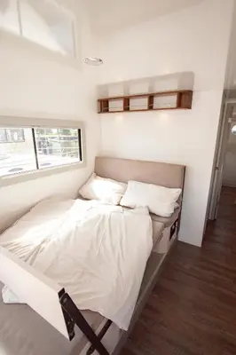 Ein Bett oder Betten in einem Zimmer der Unterkunft Hausboot