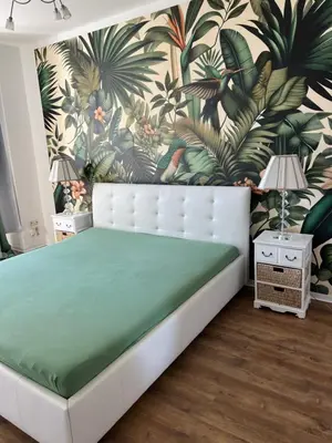 Ein Bett oder Betten in einem Zimmer der Unterkunft Ferienwohnung Bella
