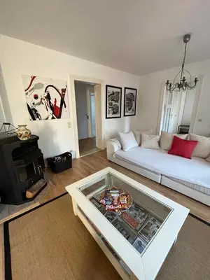 Ein Sitzbereich in der Unterkunft Ferienwohnung Bella