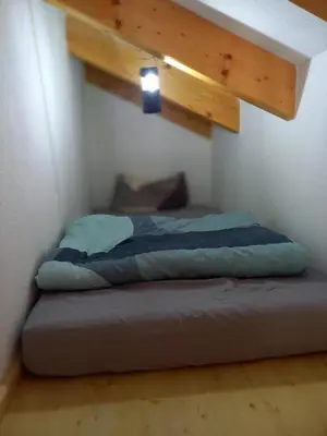 Ein Bett oder Betten in einem Zimmer der Unterkunft NEU! Ferienhaus am See