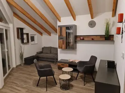Ein Sitzbereich in der Unterkunft NEU! Ferienhaus am See