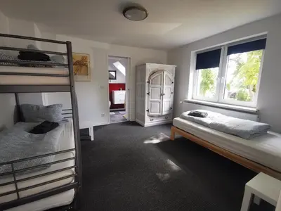 Ein Bett oder Betten in einem Zimmer der Unterkunft Haus Laila
