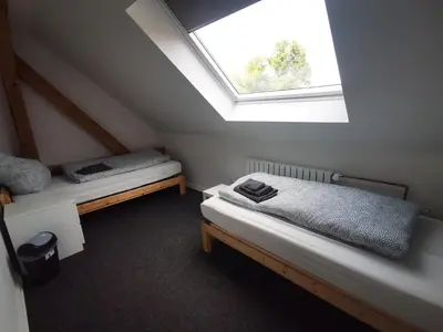 Ein Bett oder Betten in einem Zimmer der Unterkunft Haus Laila