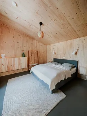Ein Bett oder Betten in einem Zimmer der Unterkunft Traumhaftes Ferienhaus am See am Lübbesee in Templin