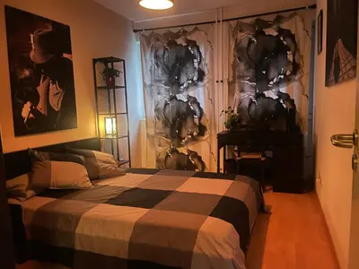 Ein Bett oder Betten in einem Zimmer der Unterkunft Alt Treptow Fashion HQ