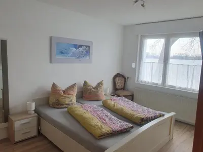 Ein Bett oder Betten in einem Zimmer der Unterkunft Ferienhof-Havelblick