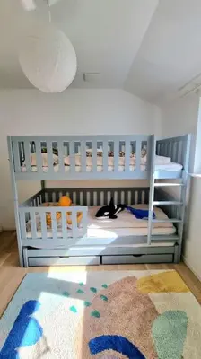 Ein Bett oder Betten in einem Zimmer der Unterkunft Haus am Waldrand und in Seenähe