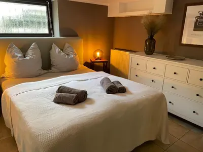 Ein Bett oder Betten in einem Zimmer der Unterkunft In Abrahams Schoß