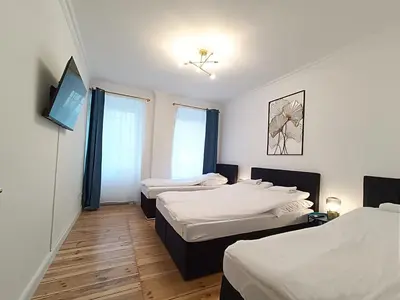 Ein Bett oder Betten in einem Zimmer der Unterkunft central 2 Bedroom Apartment in Kreuzberg