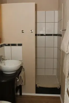 Ein Badezimmer in der Unterkunft Ferienwohnungen In den Wiesen Oranienburg