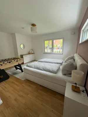 Ein Bett oder Betten in einem Zimmer der Unterkunft Potsdams Traumwohnung