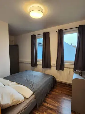 Ein Bett oder Betten in einem Zimmer der Unterkunft Vor den Toren Berlins