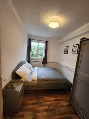 Ein Bett oder Betten in einem Zimmer der Unterkunft Vor den Toren Berlins
