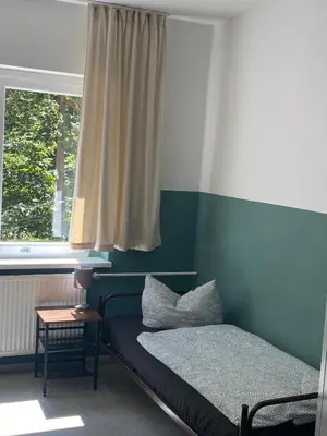 Ein Bett oder Betten in einem Zimmer der Unterkunft A2rooms
