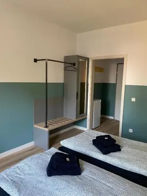Ein Bett oder Betten in einem Zimmer der Unterkunft A2rooms