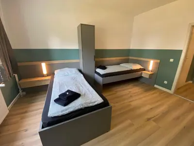 Ein Bett oder Betten in einem Zimmer der Unterkunft A2rooms