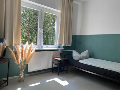 Ein Bett oder Betten in einem Zimmer der Unterkunft A2rooms