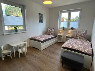 Ein Bett oder Betten in einem Zimmer der Unterkunft Exklusive Ferienwohnung bei Berlin, bis 5 Gäste, große Terrasse, Garten