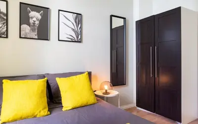 Ein Bett oder Betten in einem Zimmer der Unterkunft Family Apartment in central location