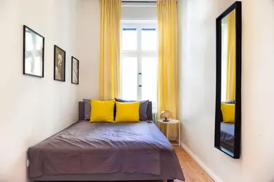 Ein Bett oder Betten in einem Zimmer der Unterkunft Central Apartment
