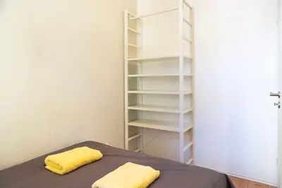 Ein Bett oder Betten in einem Zimmer der Unterkunft Central Apartment