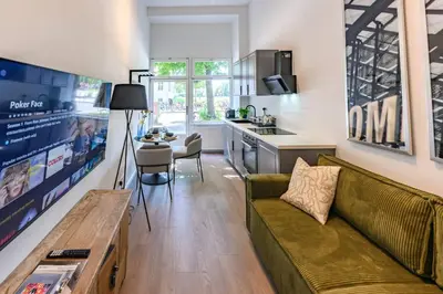 Ein Sitzbereich in der Unterkunft Cozy Lofts Next To Berliner Wall
