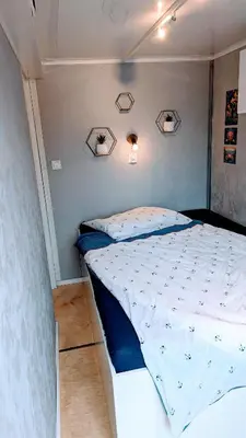 Ein Bett oder Betten in einem Zimmer der Unterkunft Schwimmendes Ferienhaus 