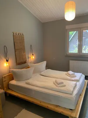 Ein Bett oder Betten in einem Zimmer der Unterkunft Haus am Lübbesee