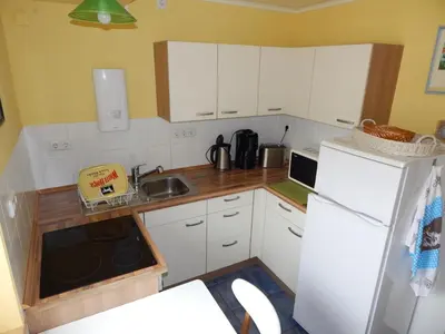 Küche/Küchenzeile in der Unterkunft Ferienwohnung Zesch am See