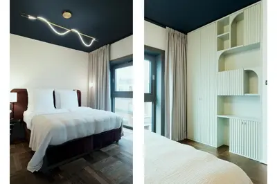 Ein Bett oder Betten in einem Zimmer der Unterkunft The Garden Suites by Suite030