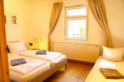 Ein Bett oder Betten in einem Zimmer der Unterkunft Romantikferienhaus am Schlösschen - Sauna, Kamin & Seenlandschaft nahe Berlin