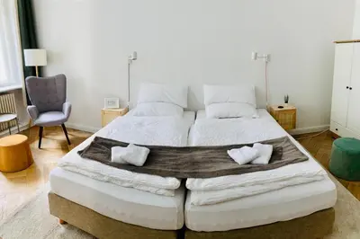 Ein Bett oder Betten in einem Zimmer der Unterkunft Serviced Room im Herzen Berlin‘s