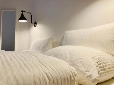 Ein Bett oder Betten in einem Zimmer der Unterkunft Serviced Room im Herzen Berlin‘s