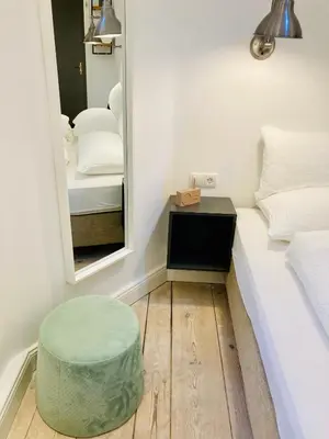 Ein Bett oder Betten in einem Zimmer der Unterkunft Serviced Room im Herzen Berlin‘s