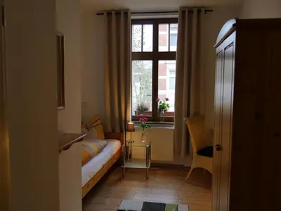 Ein Bett oder Betten in einem Zimmer der Unterkunft Pension La rose