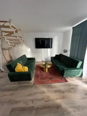 Ein Sitzbereich in der Unterkunft Urban house for families and Berlin tourists