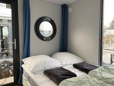 Ein Bett oder Betten in einem Zimmer der Unterkunft Hausboot Celina