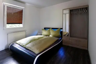 Ein Bett oder Betten in einem Zimmer der Unterkunft FerienBeiBerlin