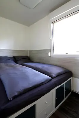 Ein Bett oder Betten in einem Zimmer der Unterkunft FerienBeiBerlin