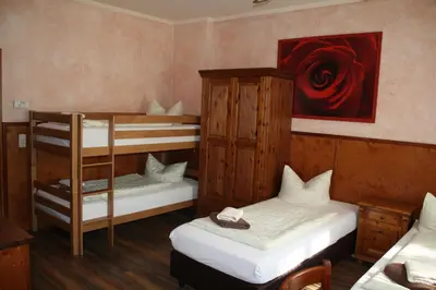 Ein Bett oder Betten in einem Zimmer der Unterkunft Pensionszimmer Unicat