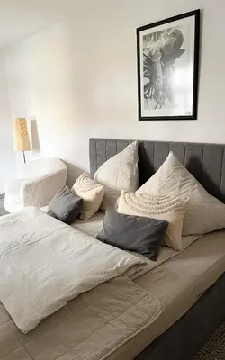 Ein Bett oder Betten in einem Zimmer der Unterkunft Ferienwohnung Kamrath Altstadt