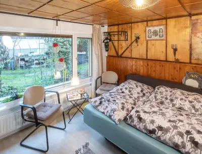 Ein Bett oder Betten in einem Zimmer der Unterkunft Wohnen im Eulengarten