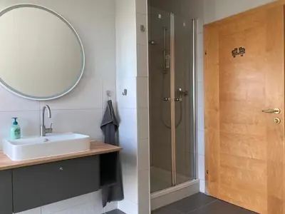 Ein Badezimmer in der Unterkunft Ferienhaus Pferdehof Birkholz