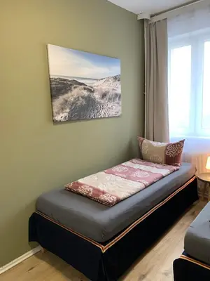Ein Bett oder Betten in einem Zimmer der Unterkunft Enjoy Berlin