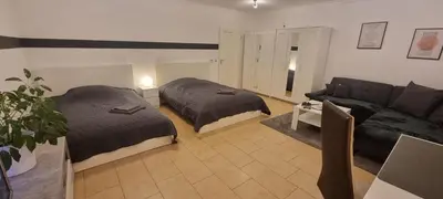 Ein Bett oder Betten in einem Zimmer der Unterkunft Monteurswohnung Deluxe